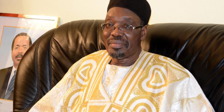 Cameroonian Minister of Communication and government spokesperson, Issa Tchiroma, speaks on October 12, 2014 in Yaounde, to AFP journalists about the release on the eve of the 27 hostages abducted on May 16 in Waza and July 27 in Kolofata in raids blamed on the Nigerian Islamist group Boko Haram. Ten Chinese and 17 local hostages,  who also included the wife of Cameroon's deputy prime minister, were all "safe and sound,"  President Paul Biya said. AFP PHOTO / PACOME PABANDJI